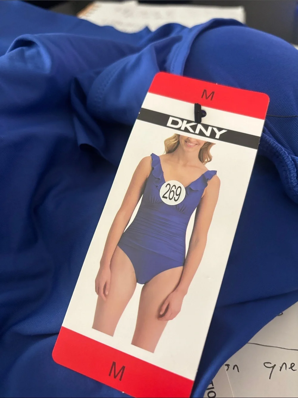 NWT DKNY Women’s Ruffle Plunge One Piece Swimsuit. Size Medium - Picture 4 of 4
